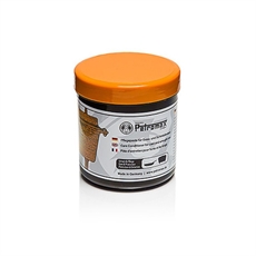 Petromax pleje til støbejern, 250 ml, med orange låg og etiket. Fremstillet i Tyskland.